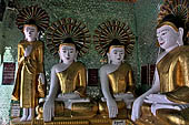 Myanmar - Sagaing, Umin Thounzeh (the 30 Caves), a colourful crescent-shaped colonnade within which there are 45 Buddha images. 